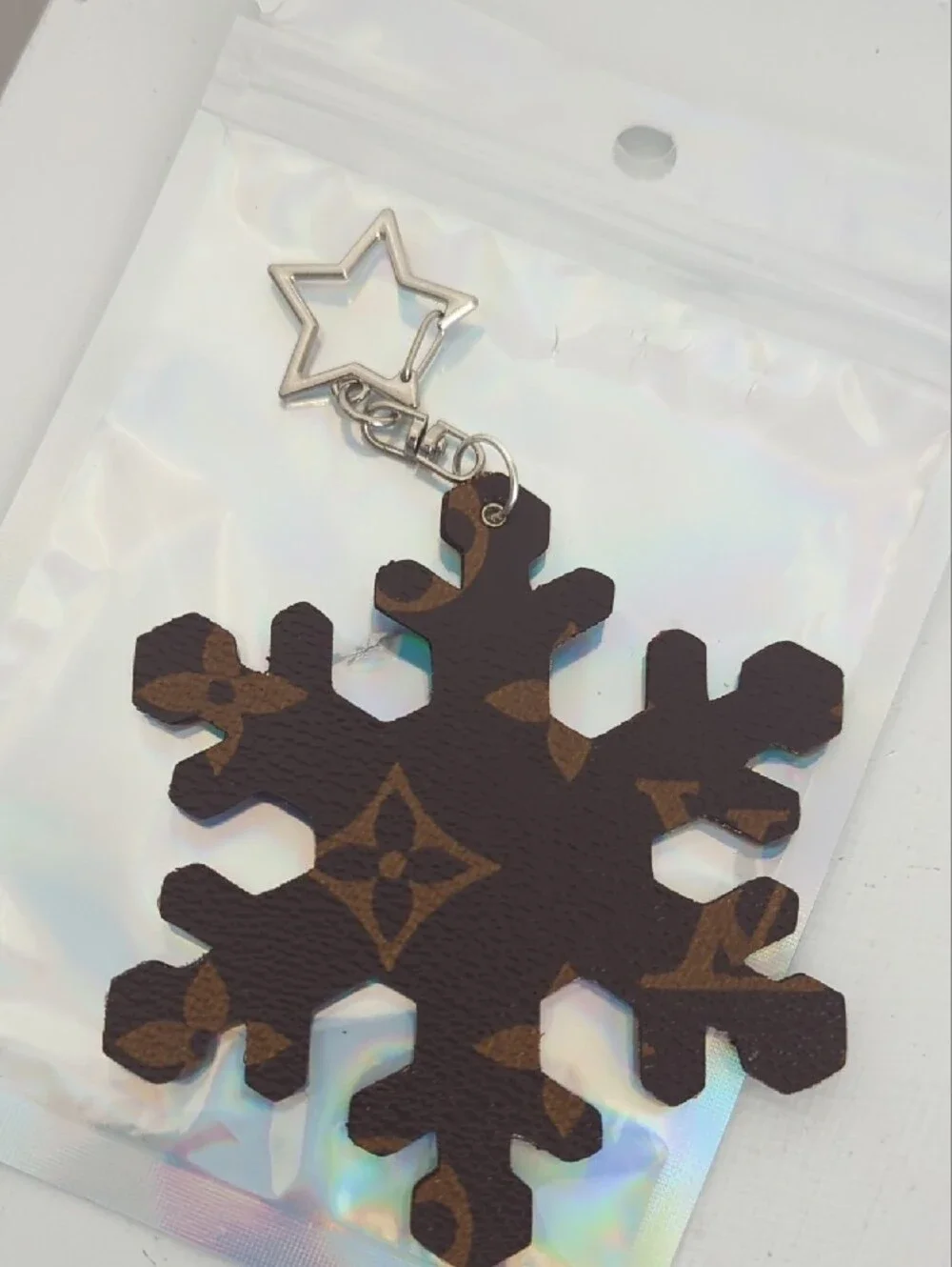 Louis Vuitton Brown Monogram Snowflake Key Charm with Silver Star Clasp COA Incl